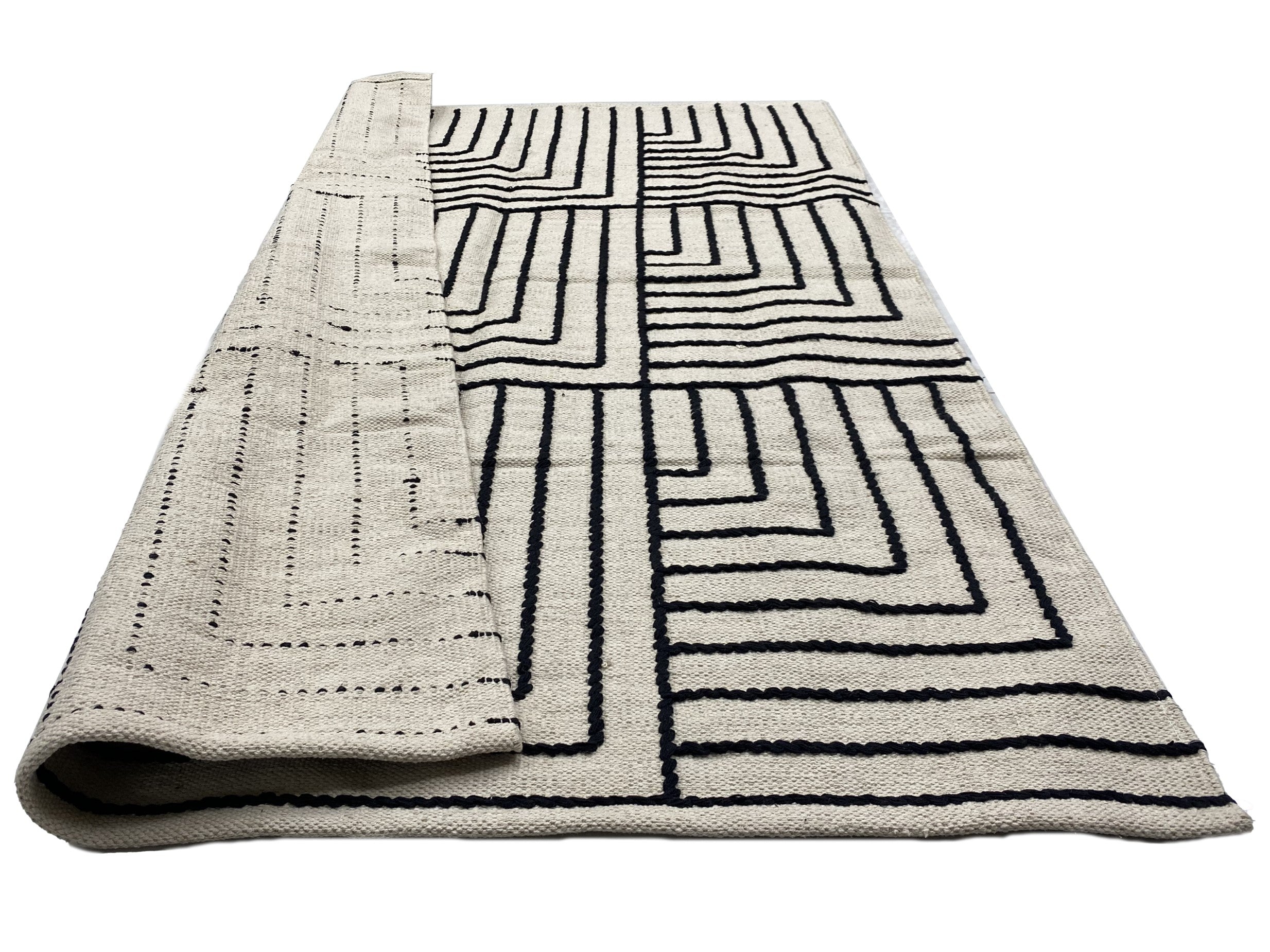 KEVO – prostokątny dywanik bawełniany z beżowymi i czarnymi wzorami, 120 x 180 cm
