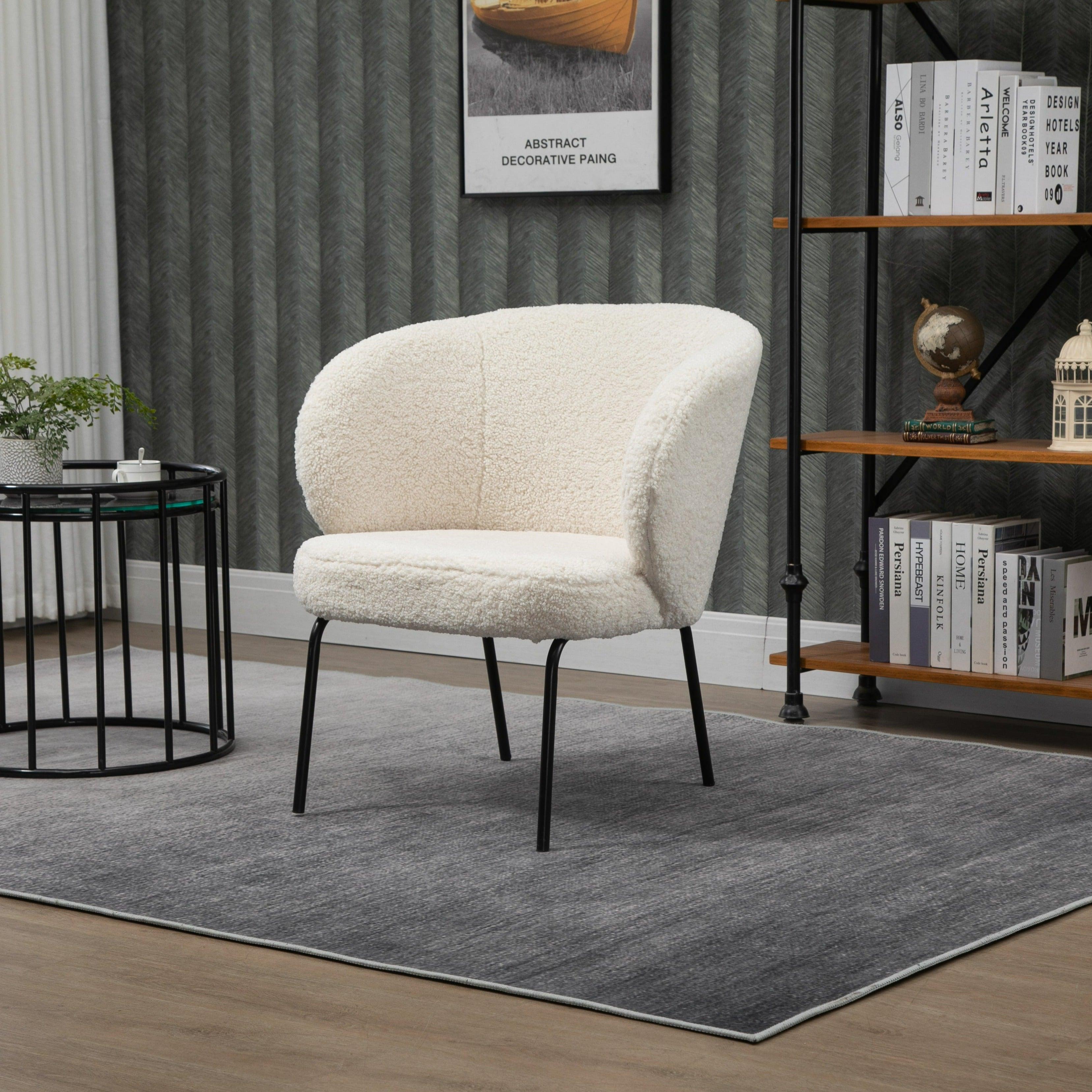 Fotel salonowy z metalu i białymi pętelkami