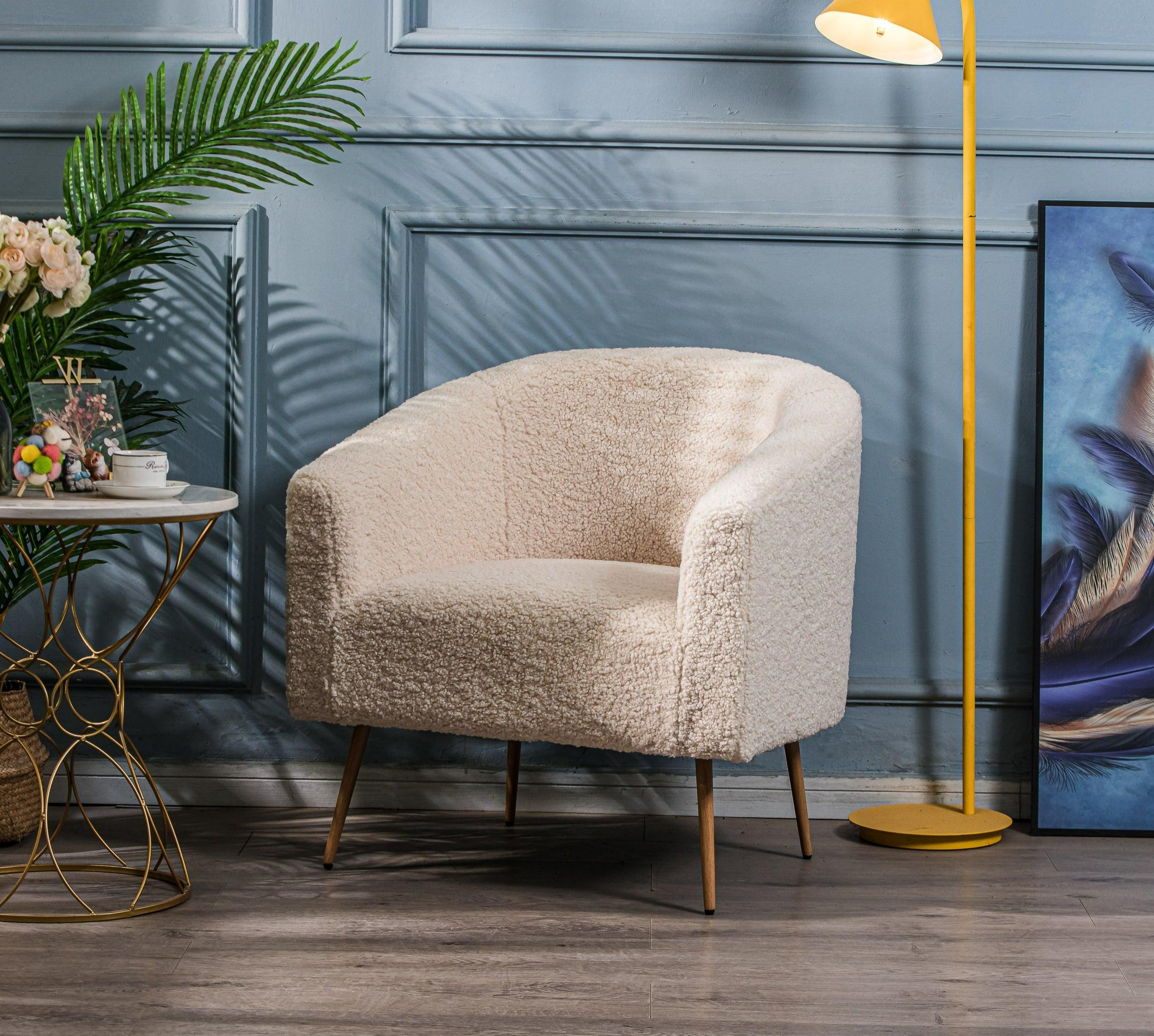 Fotel salonowy z metalu i białymi pętelkami