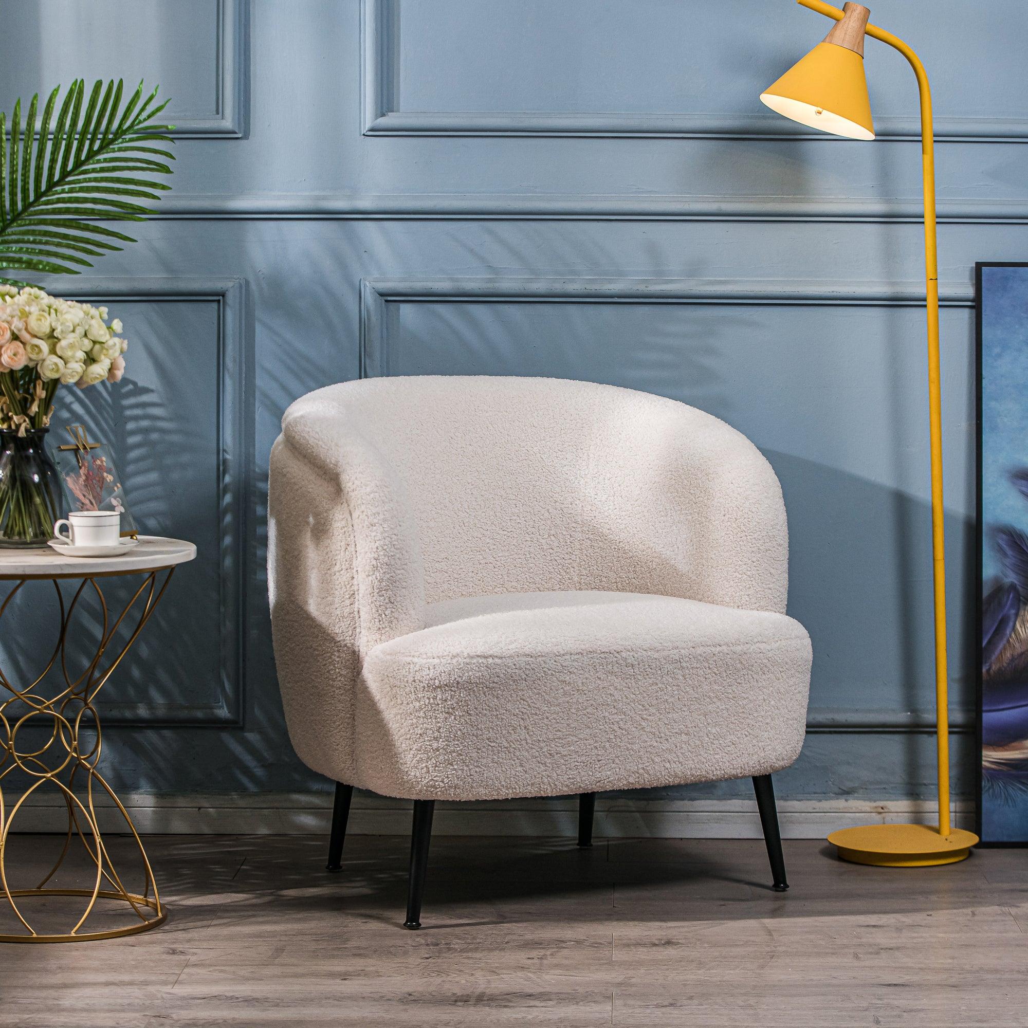 Fotel salonowy z metalu i białymi pętelkami